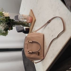 Pink Michael Kors bag with adjustable strap